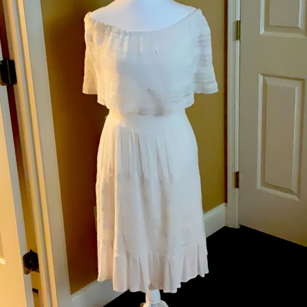White lightweight off the shoulder summer dress.